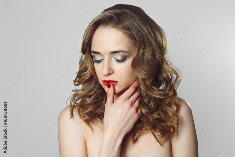 Beautiful girl with curly hair, light and airy make-up, pink lips. Beautiful girl with curly hair, light and airy make-up, pink lips.