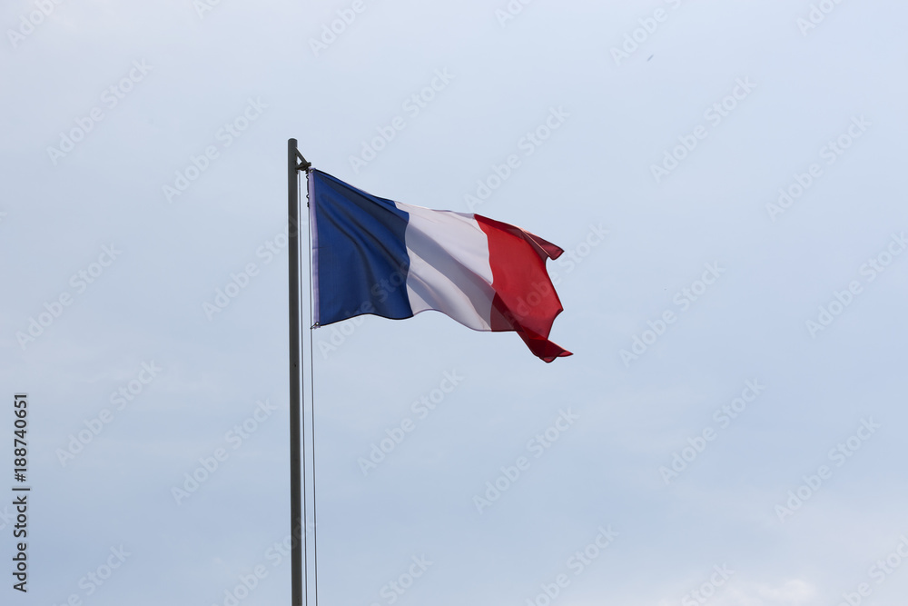 National flag of France on a flagpole National flag of France on a flagpole