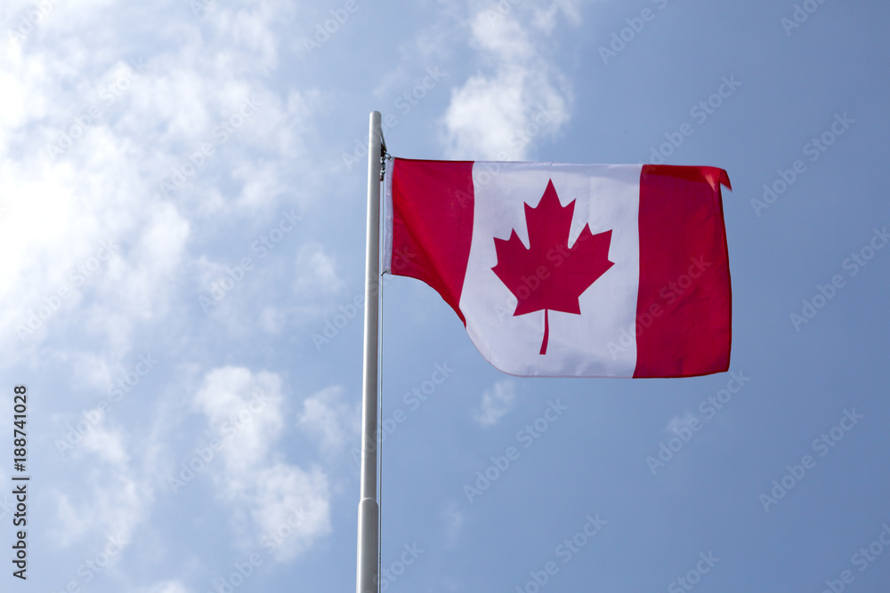 National flag of Canada on a flagpole National flag of Canada on a flagpole