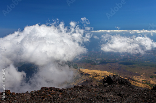 Panoramic view over the clouds from Etna at Mediterranean sea, Sicily, Italy