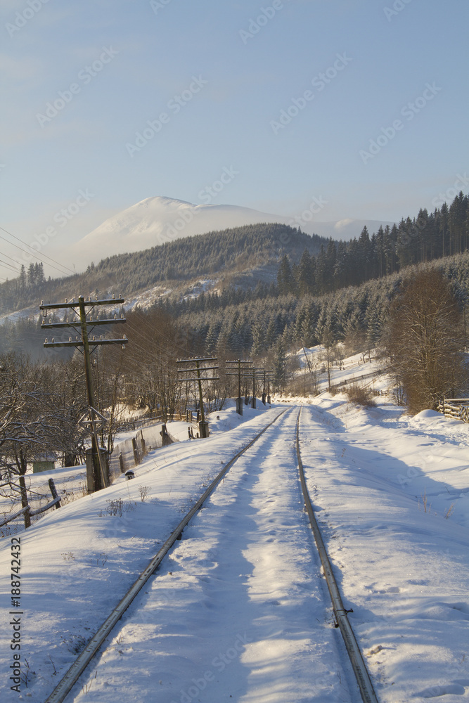 The railroad in Carpathians Mountains in the winter The railroad in Carpathians Mountains in the winter
