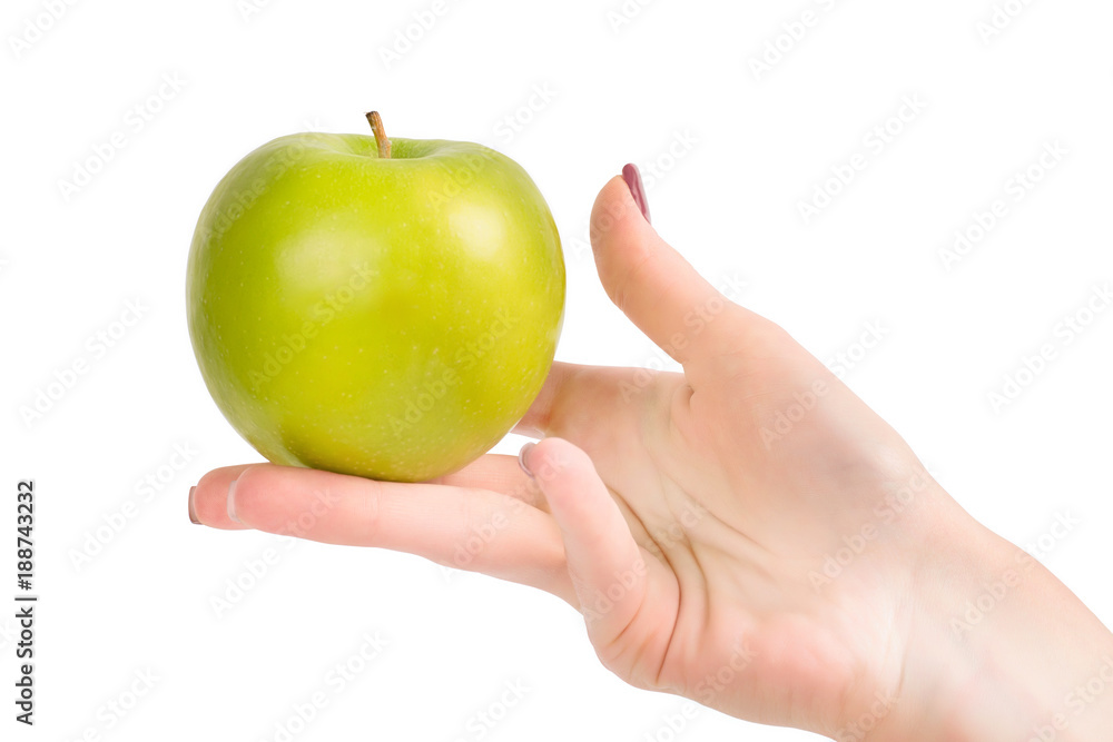 Hand holding green apple isolated with clipping path Hand holding green apple isolated with clipping path