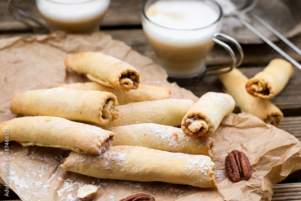 Fototapeta premium Sweet tatar cookies biscuits rolls with walnuts, hazelnuts and pecan nuts