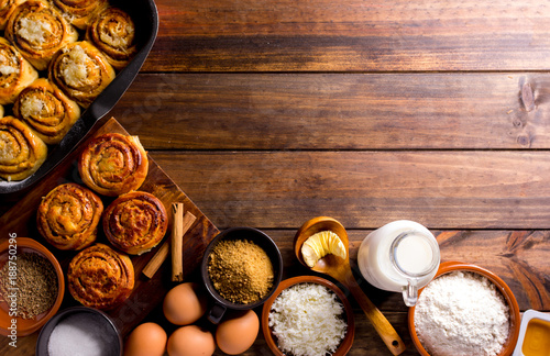 Table full of ingredients for the preparation of cinnamon rolls with cheese. golfeados desserts typical in Venezuela.