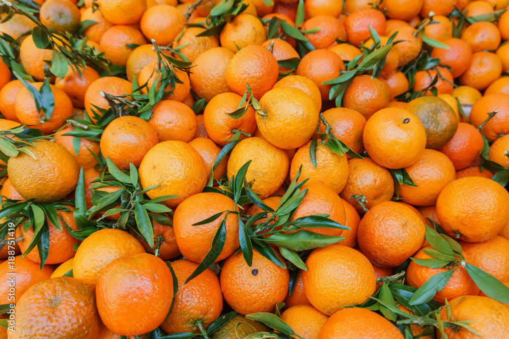 heap of ripe sweet tangerines