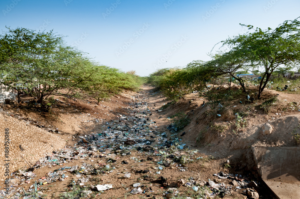 Dry river polluted from plastic waste. Dry river polluted from plastic waste.