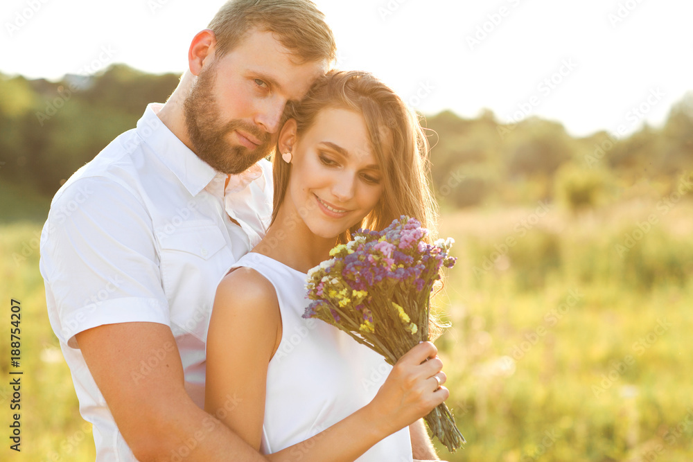 Man doing on the nature engagement girl, surprise, emotion, at sunset in St. Valentine's Day
