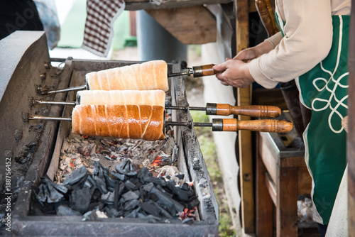 Hungarian Kurtos Kalács, Kürtoskalács, Chimney cake prepared on the street open market stall