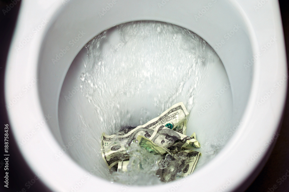 Flush money down the toilet, throws dollar bills in the toilet, loss