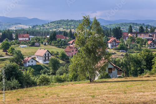 Aerial view of Sirogojno village in mountains of Zlatibor area in Serbia