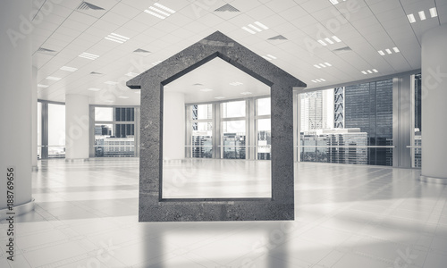 Conceptual background image of concrete home sign in modern offi