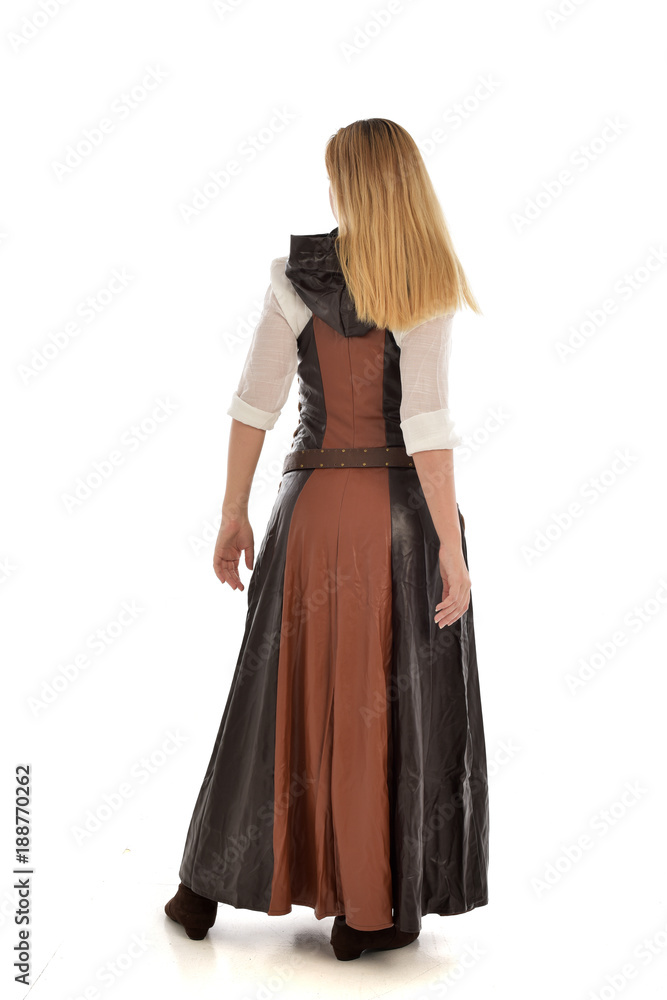 full length portrait of girl wearing brown  fantasy costume, standing pose with back to the camera on white studio background. 