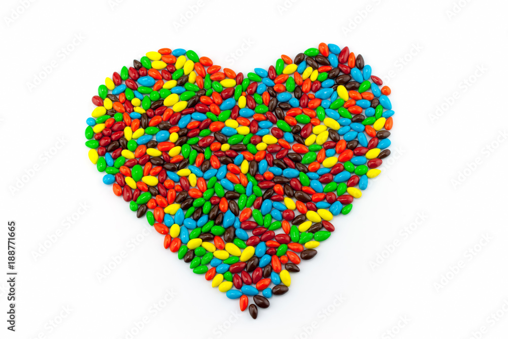 Sunflower seeds in multicolored chocolate coated, heart shape style Sunflower seeds in multicolored chocolate coated, heart shape style