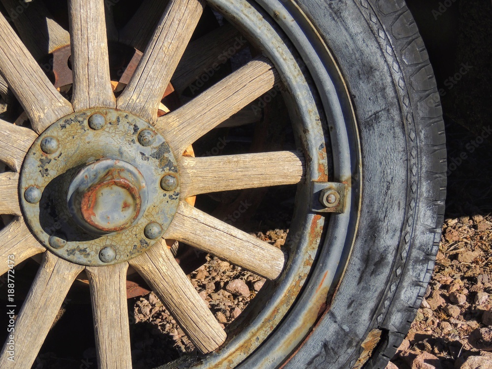 Old tires with metal Wagon wheel spikes in the desert in Arizona in a deserted ghost mining town. Old tires with metal Wagon wheel spikes in the desert in Arizona in a deserted ghost mining town.