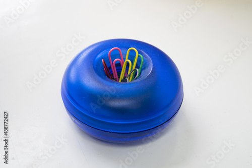 Bright dispenser for paper clips photo