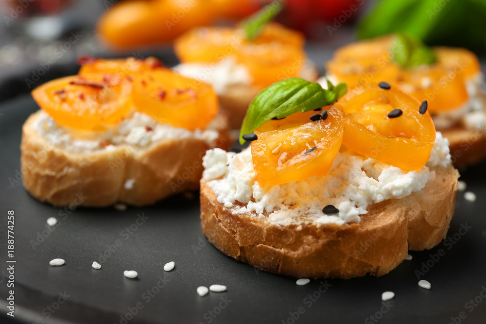 Tasty bruschetta with tomatoes on plate, closeup Tasty bruschetta with tomatoes on plate, closeup