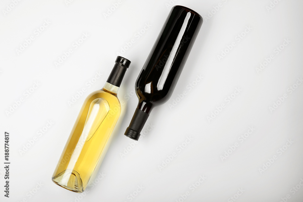 Bottles of wine on light background Bottles of wine on light background