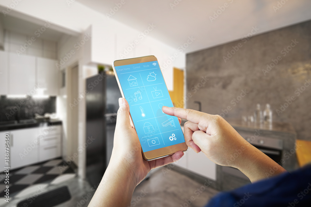 custom made wallpaper toronto digitalFemale hand is adjusting lighting with smart phone. .Smart home control concept.