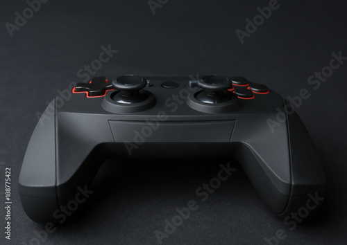 Video game controller on dark background © Africa Studio