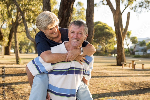 portrait of American senior beautiful and happy mature couple around 70 years old showing love and affection smiling together in the park © Wordley Calvo Stock