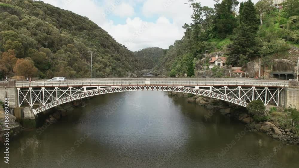 morning panning shot of the cataract gorge bridge in the city of launceston in tasmania, australia morning panning shot of the cataract gorge bridge in the city of launceston in tasmania, australia