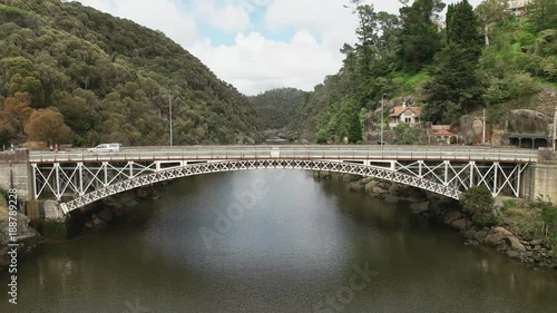 morning panning shot of the cataract gorge bridge in the city of launceston in tasmania, australia photo