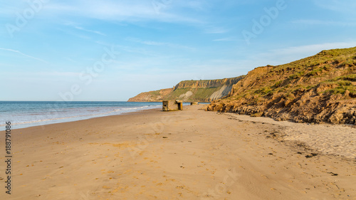 Old bunker and beach at Cayton Bay near Scarborough, North Yorkshire, UK