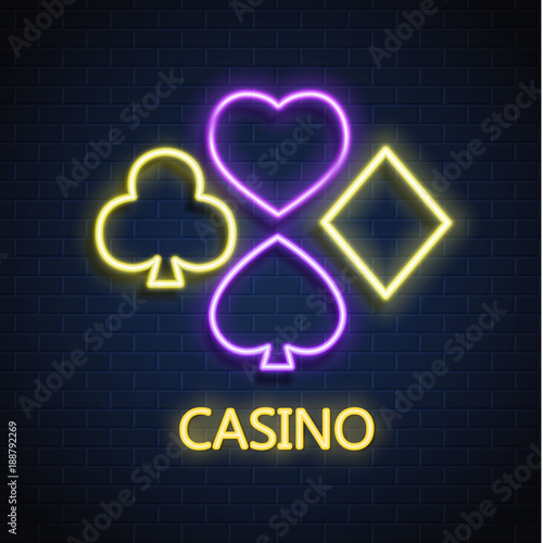 Vector neon casino poker card suit sign brick wall
