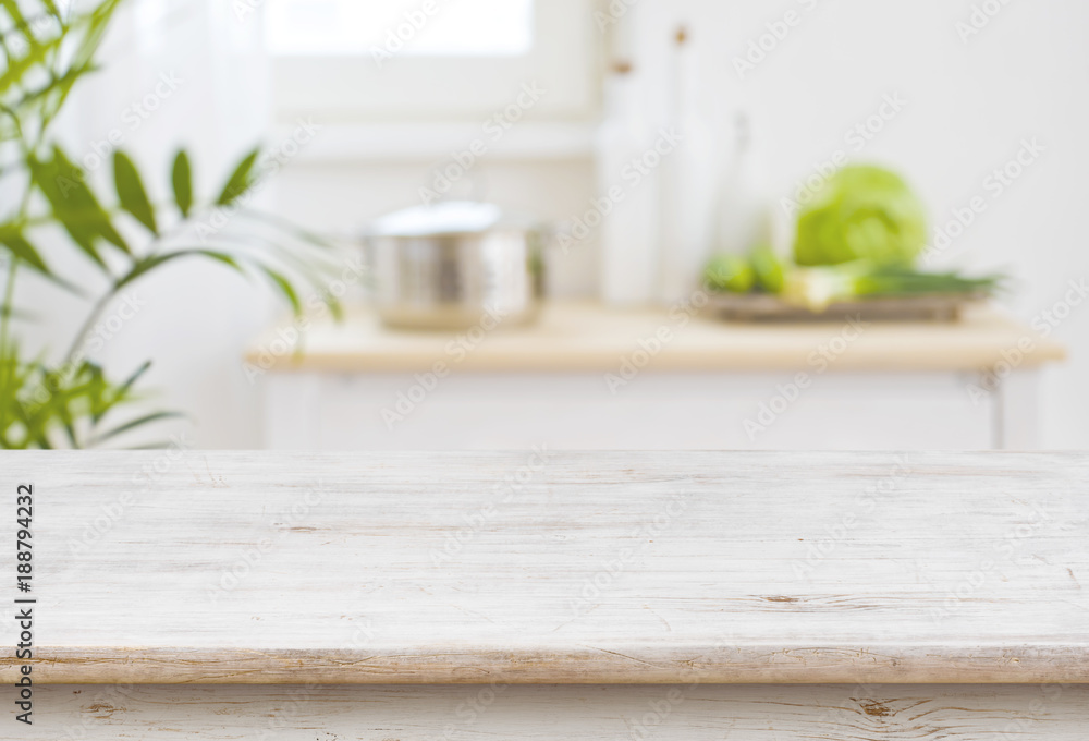 Table top and blurred kitchen room as background - obrazy, fototapety, plakaty 