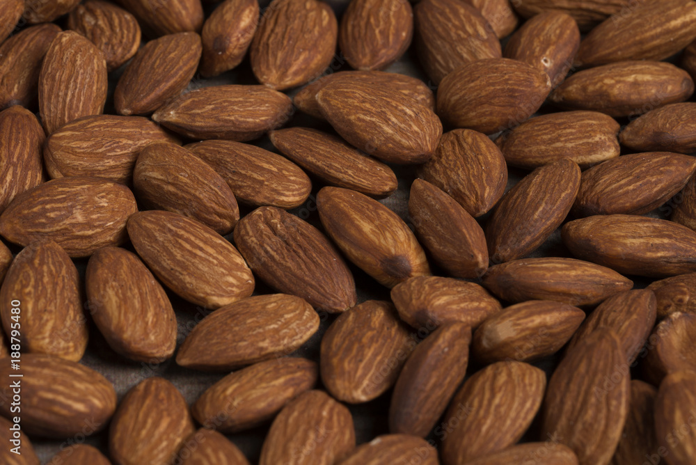 Peeled almonds closeup. For vegetarians. Almonds. Background.
Peeled almonds closeup. For vegetarians. Almonds. Background.
