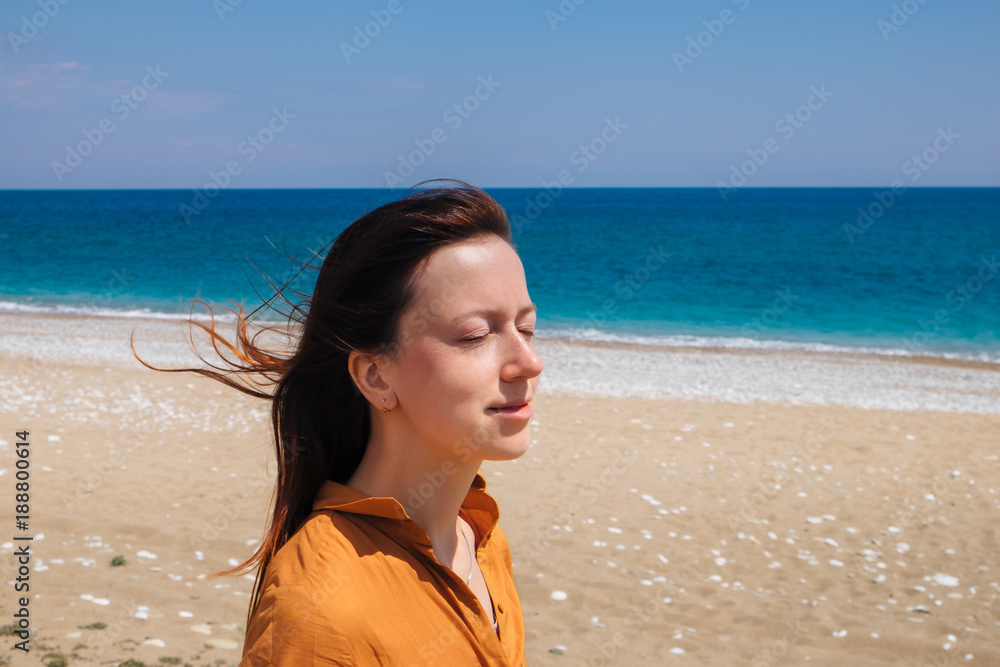 Lonely Cirali sand beach and one happy female traveler Lonely Cirali sand beach and one happy female traveler