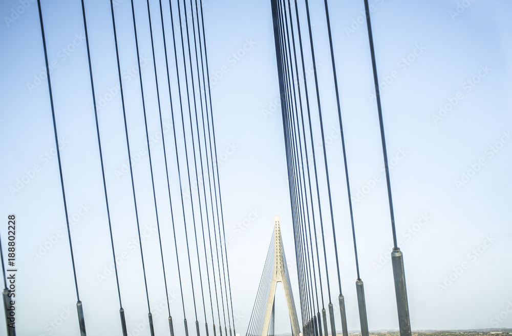 Obraz premium Driving car along the Guadiana International Bridge