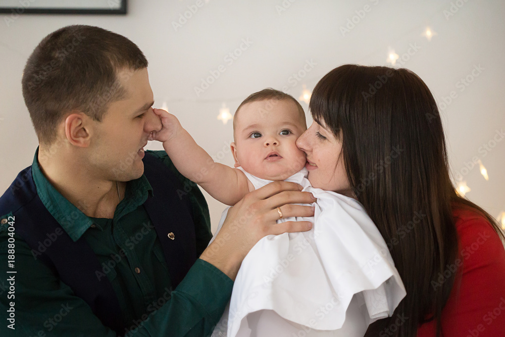 father, mother and child. A married couple with a six-month-old daughter. a family. father, mother and child. A married couple with a six-month-old daughter. a family.