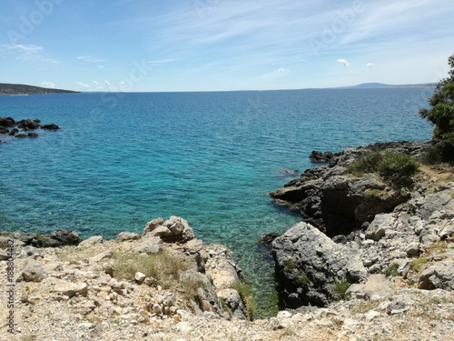 Hrvatian Porec rocky beach of Medditerean sea