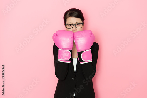 professional business woman with boxing gloves