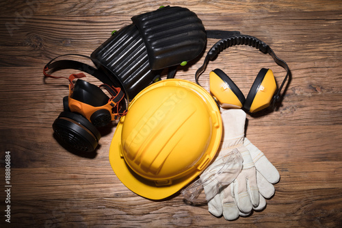 Yellow Hard Hat With Safety Equipment photo