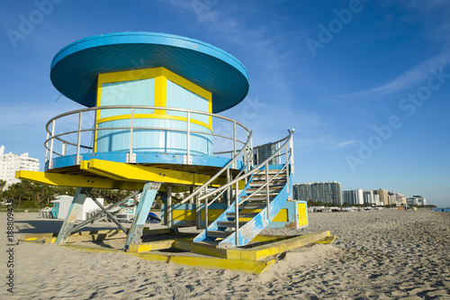 Bright scenic morning view of an iconic circular lifeguard tower standing empty on South Beach in Miami, Florida © lazyllama