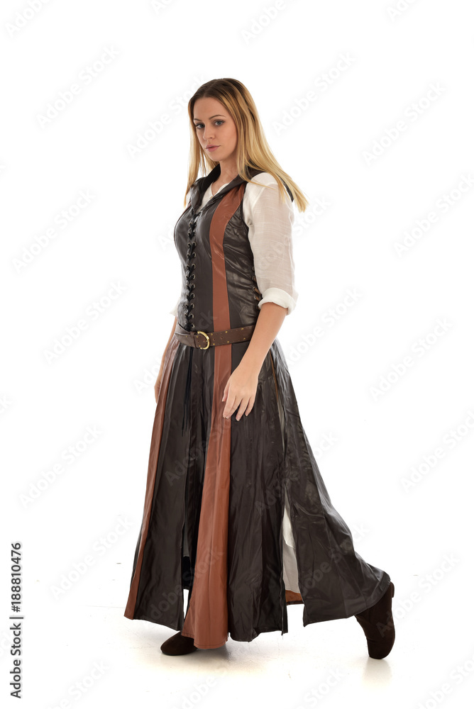 full length portrait of girl wearing brown fantasy costume. standing pose on white studio background. full length portrait of girl wearing brown fantasy costume. standing pose on white studio background.