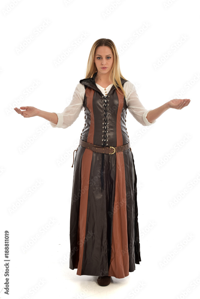 full length portrait of girl wearing brown fantasy costume. standing pose on white studio background. full length portrait of girl wearing brown fantasy costume. standing pose on white studio background.