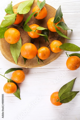 Mandarin Oranges on rustic white wooden background