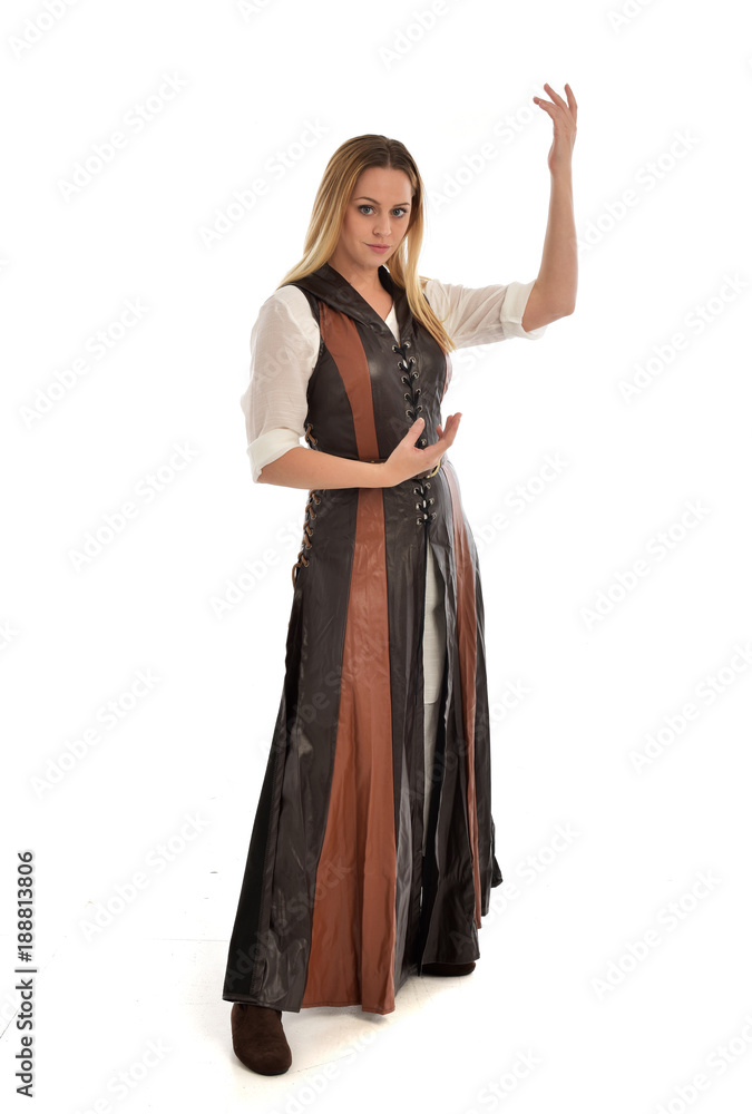 full length portrait of girl wearing brown  fantasy costume. standing pose on white studio background. 