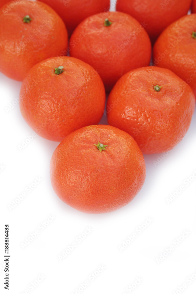 Tangerines in a row isolated on white background Tangerines in a row isolated on white background