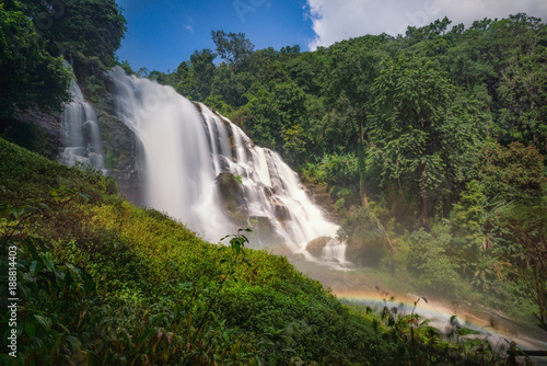 Waterfall and water spray in the air with the rain forest surround at Wachirathan Waterfall,Doi Inthanon National Park,Chiang Mai province,Northern Thailand.