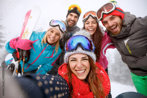 Boys and girls together on skiing