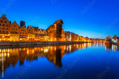Gdansk at night with historic port crane reflected in Motlawa river, Poland © Patryk Kosmider