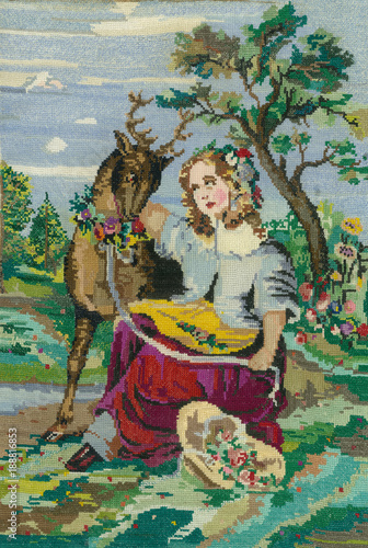 a girl and a deer. embroidery