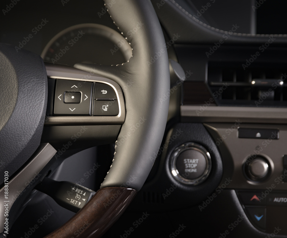 media control buttons on the steering wheel, modern luxury car interior details