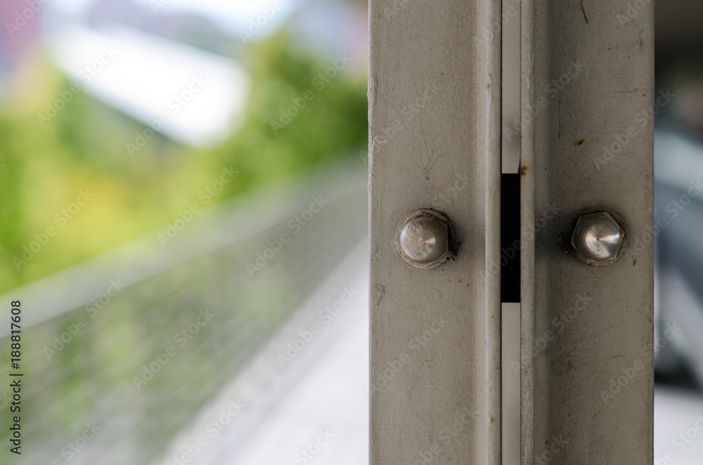 Architecture, special construction with steel beams, bolts and tightening nuts. Architecture, special construction with steel beams, bolts and tightening nuts.