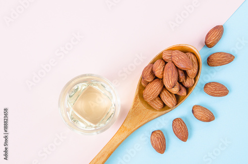 Peeled almonds seeds with almond oil.