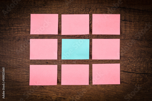 Blank many pink sticky notes.